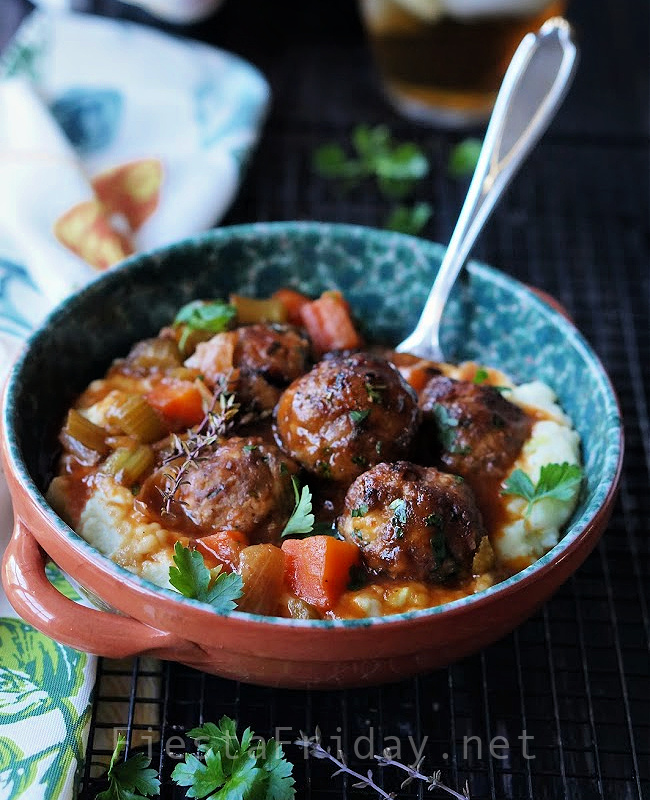 Stuffed Meatballs in Guinness Gravy! Served on Colcannon! It's not right to serve this just once a year on St. Patrick's Day! I’m so transparently not excited about this.? #meatballs #stuffed meatballs #guinness #beer #blondeguinness #stpatricksday #dublinercheese #cheese